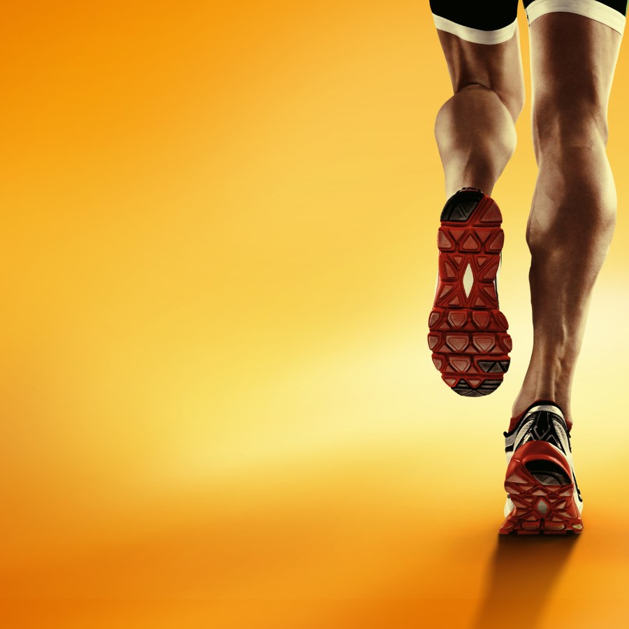 Jambes de coureur en action : zone travaillée en massage sportif